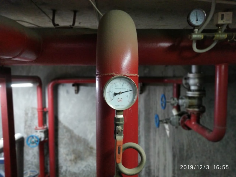 Pressure gauge and valve in fire protection pump room